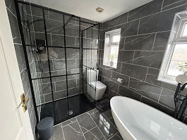 Luxury dark walk-in shower enclosure